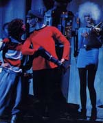 Lewis Cowen as  Bang Bang the space policeman who doesn't like shooting people, but does it all the same